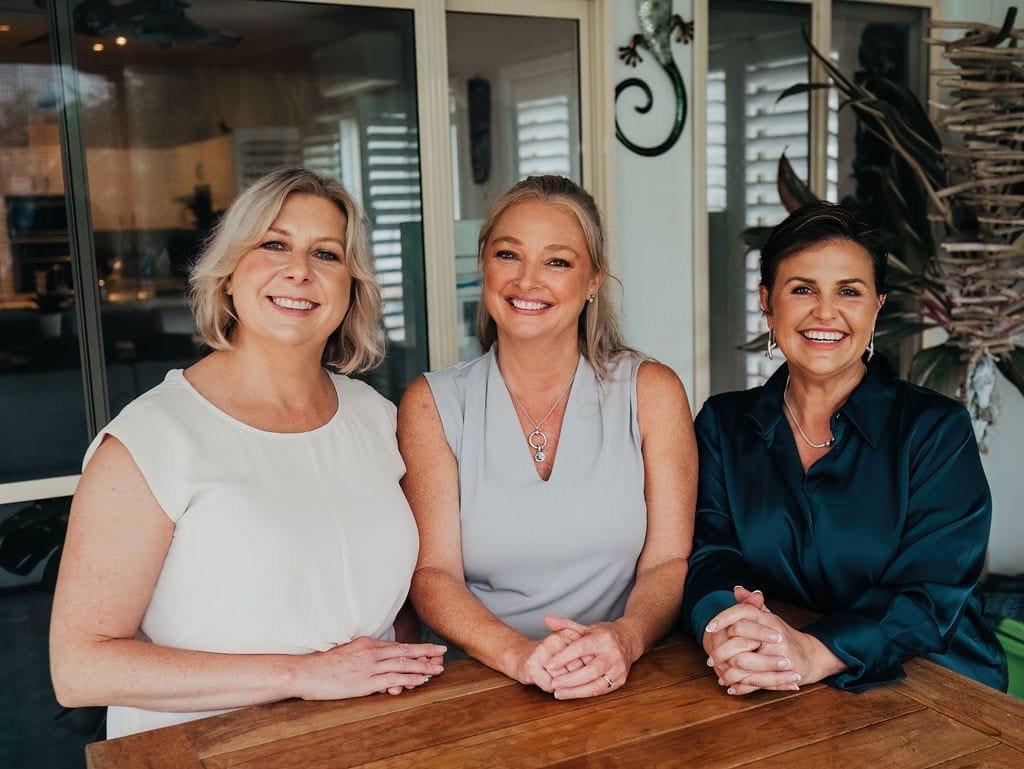 The About Business Bookkeeping team of expert bookkeepers and payroll specialists posing together.